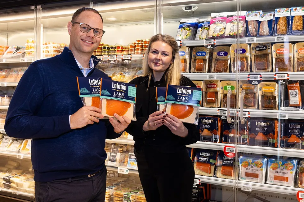 Salmon Evolution Chief Commercial Officer Odd Frode Roaldsnes (left) and Marketing Manager Ingrid Humlung with the land-based farmer's smoked salmon product, to be sold under the Lofoten brand.