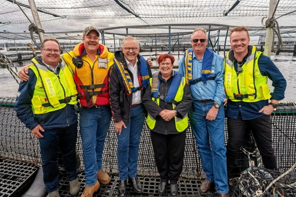 Australian Prime Minister Anthony Albanese with Tassal salmon farm workers.