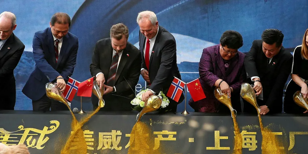 Marine Harvest and Alibaba representatives at the MOU signing ceremony in Shanghai.