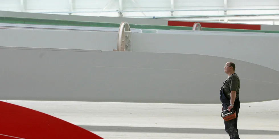A worker stands by at a German wind turbine factory.