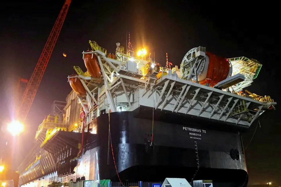 Towering: This image of the P-70 was taken shortly before departure from China, but shocked residents of Niteroi got a similar view when the vessel broke its moorings in Brazil