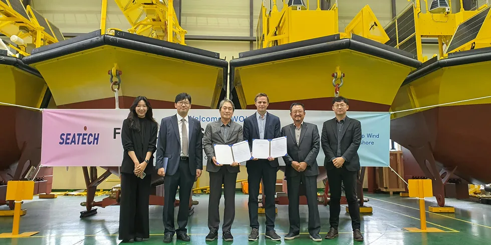 Done deal: (l to r) Seatech's Choi Jiye, Gang Yongsoo and Jang Pilsoon, and Deep Wind Offshore's Hans Petter Øvrevik, HK Song and SB Jeon