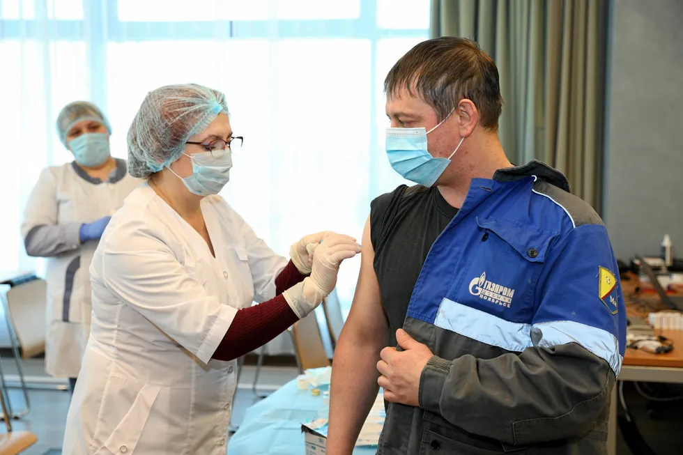 New rules: Covid-19 vaccination of a worker at Gazprom's producing subsidiary in the Yamal-Nenets region in Russia, Gazpromdobycha Noyabrsk