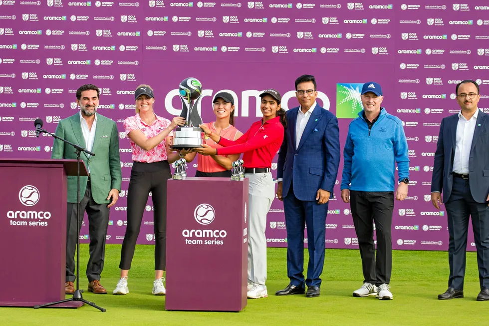 Victorious: Team Cowan — Sarina Schmidt, Olivia Cowan and Diksha Dagar — with the trophy at the initial Aramco Team Series tournament of the Ladies European Tour in London