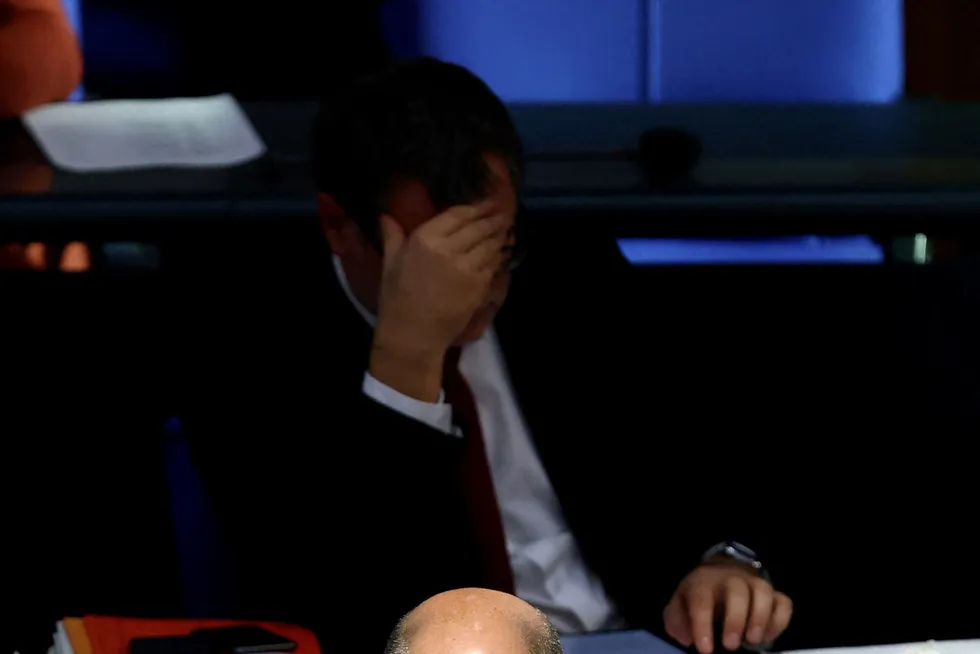 Brakes off: German Chancellor Olaf Scholz listens to a Bundestag debate on whether to relax constitutional debt limits to help ease energy costs