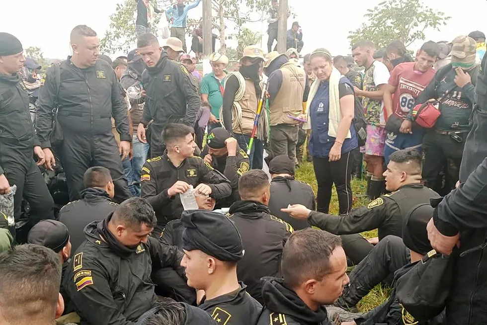 Talks: protesters demanding Emerald Energy builds roads in San Vicente del Caguan, Colombia.