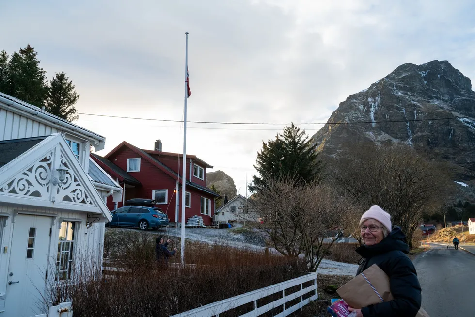 Tove Os is the widow of Steinar Olaisen, who founded Nova Sea. She finds the sale of her husband's life's work sad. Here, a neighbor is flying the flag at half-mast for the occasion.