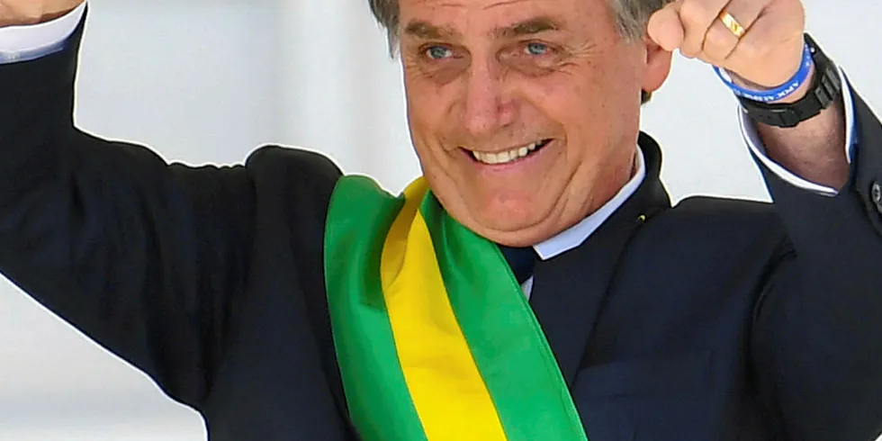 Brazil’s new president, Jair Bolsonaro, acknowledges the crowd at his inauguration ceremony in Brasilia on 1 January