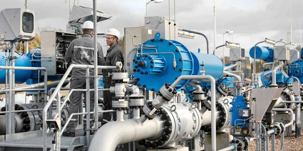 Workers at Uniper's Etzel gas storage in Germany