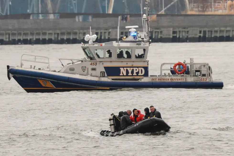 A New York Police Department scuba team rides to the site, Friday, 11 April 2025, where a sightseeing helicopter crashed a day earlier into the Hudson River in Jersey City, New Jersey on Thursday.