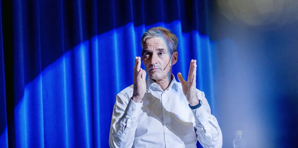 Norwegian Prime Minister Jonas Gahr Store is asking salmon farming companies to pay a lot -- in part because they paid so little for so long.