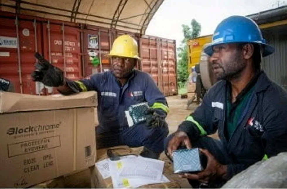 On location: High Arctic Energy workers in Papua New Guinea.