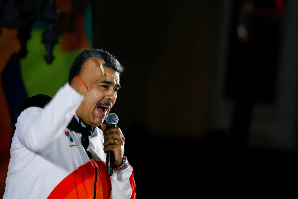 Adamant: Venezuela's President Nicolas Maduro addresses supporters during a referendum over Venezuela's rights to a major part of Guyana.