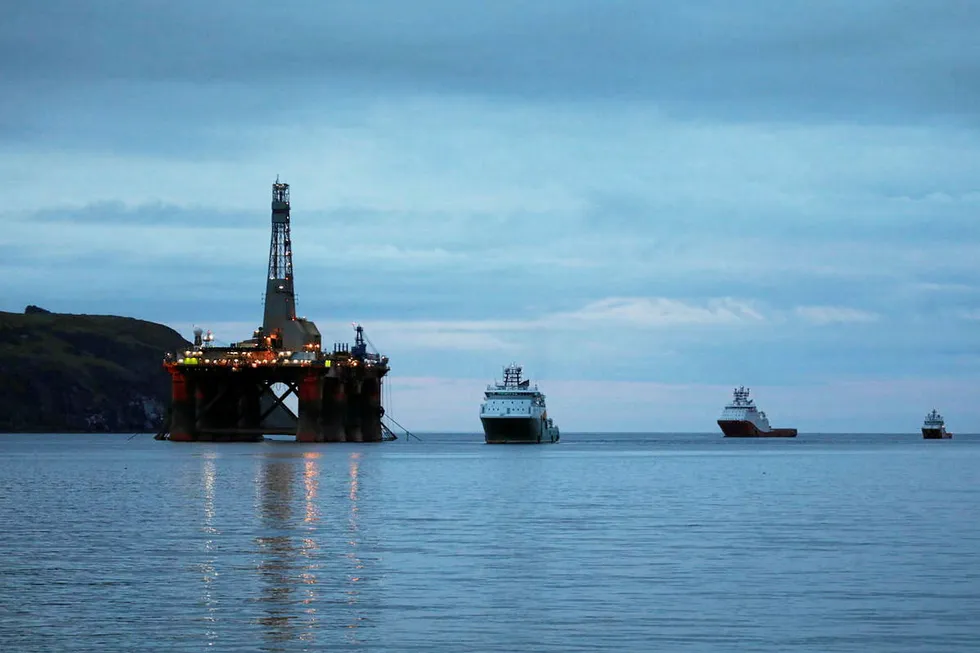 Protest: a Greenpeace climber on the Paul B Loyd Jr, owned by Transocean, which was on its way to the Vorlich field