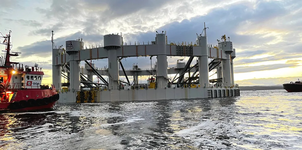 The first sea cage in Arctic Offshore Farming is being launched at the Fellesholmen site.