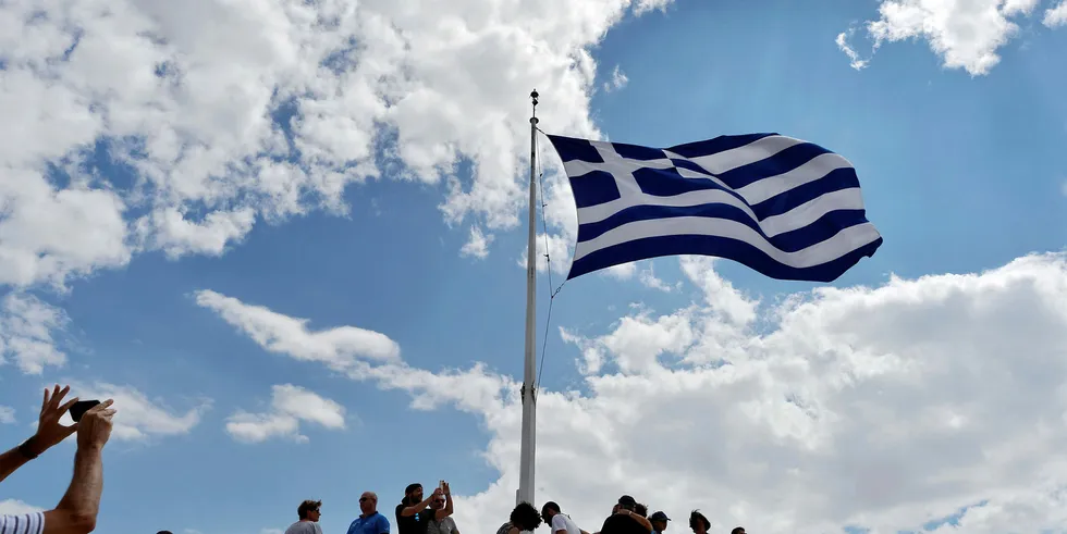 Greek flag atop the Acropolis archaeological site
