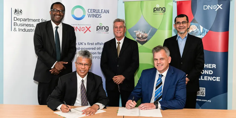 TRANSITION TEAM: UK secretary of state Kwasi Kwarteng (top left) observes the signing between Zainal Abidin Abd Jalil and Rob Fisher of Ping Petroleum with Dan Jackson of Cerulean Winds and Tan Sri Syed Zainal Abidin Syed Mohamed Tahir of DNeX