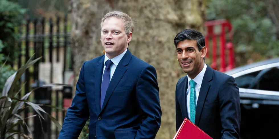 UK prime minister Rishi Sunak (R) and energy and net-zero secretary Grant Shapps (L)