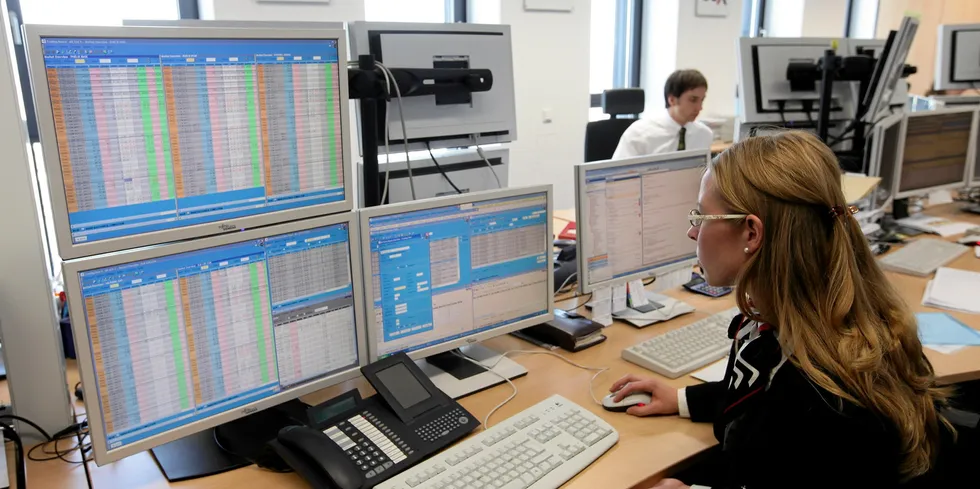 Employee monitors price developments the European Energy Exchange (EEX) in Leipzig, Germany.