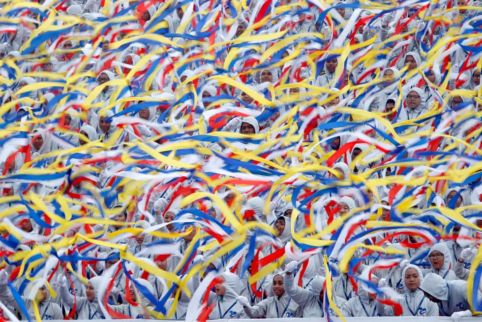Malaysian students waves ribbons with colours of the national flag during the 59th National Day celebrations at the Independence Square in Kuala Lumpur, Malaysia on 31 August 2016
