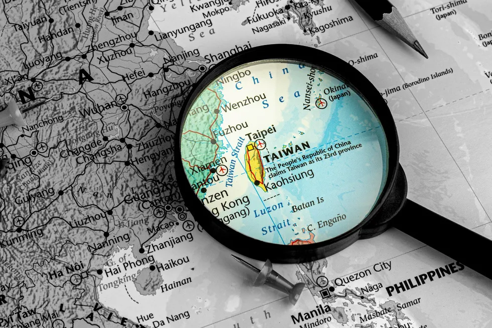 magnifying glass on the world map selective focus at Taiwan map. - economic and business concept. taiwan. Taiwan map.
