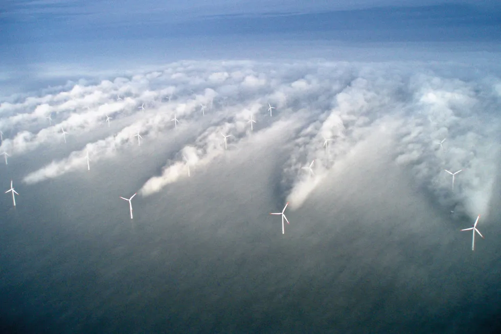 Low-hanging fog shows what is not usually possible to see with the naked eye, wind wakes trailing behind turbines at Vattenfall’s Horns Rev wind farm off Denmark.