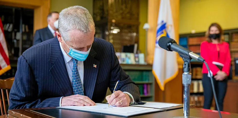 Charlie Baker signs the Bill.