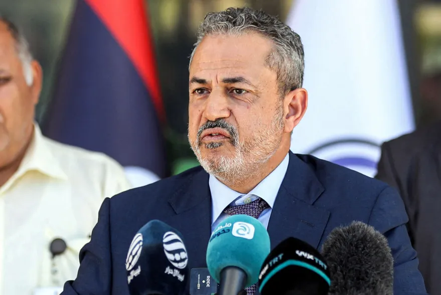 Crude production: Farhat Bengdara (centre), chairman of Libya's National Oil Corporation.