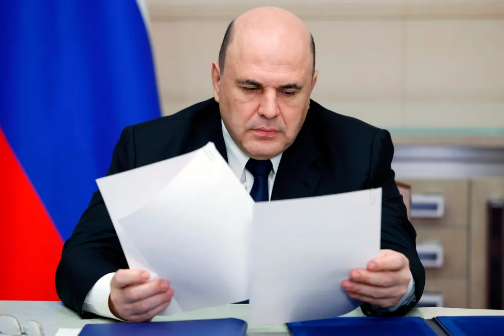 Paperwork: Russian Prime Minister Mikhail Mishustin.