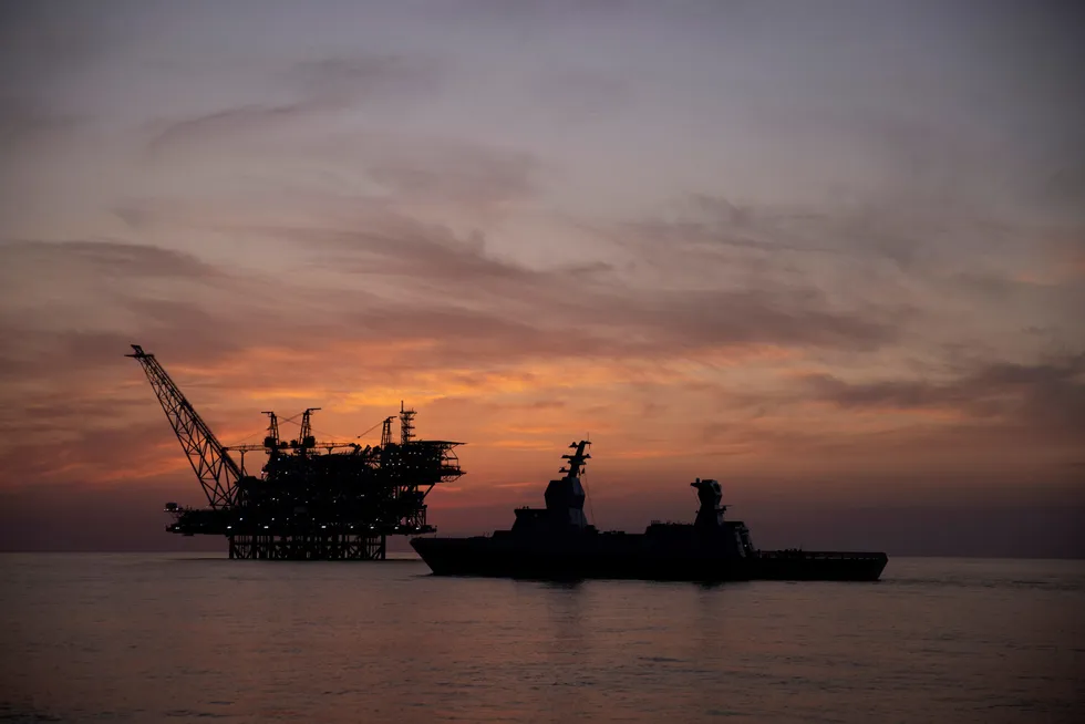 Agreement sealed: an Israeli naval vessel passes in front of the Leviathan gas platform