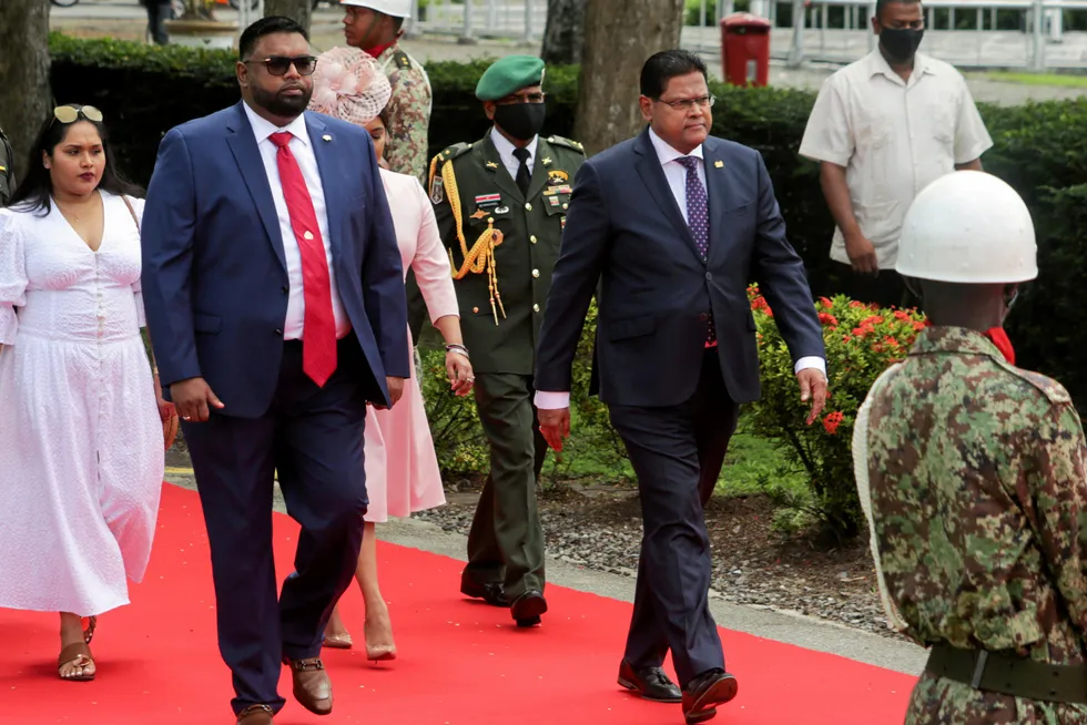Front row: Guyana’s President Mohamed Irfaan Ali (left) and Suriname’s President Chandrikapersad Santokhi