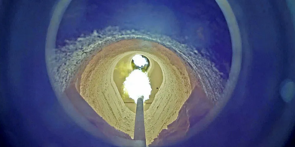 Flame from biofuel in burner for pilot fossil-free iron ore production