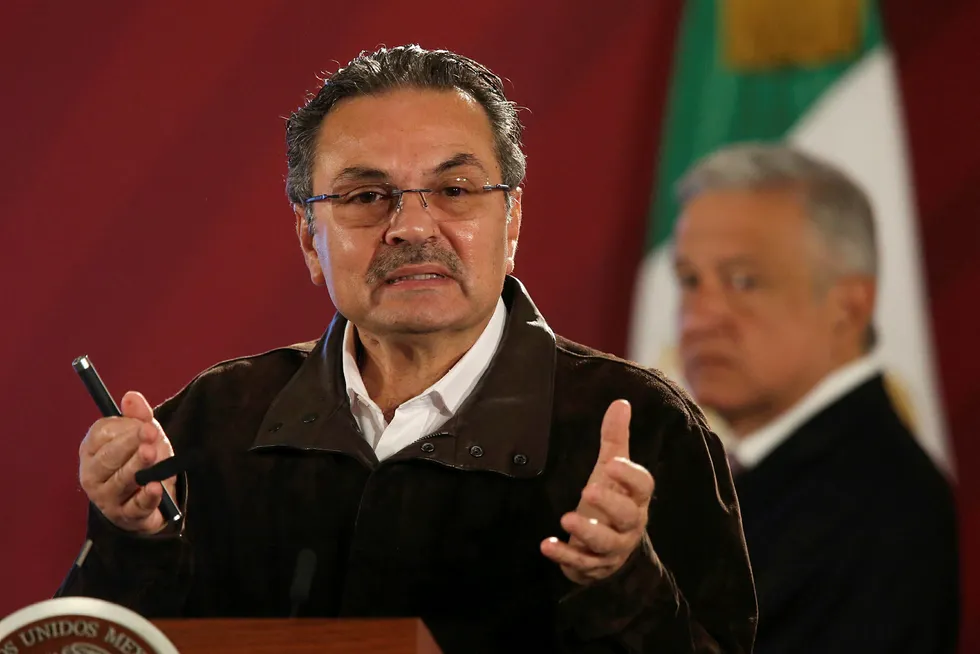 Pemex Chief Executive Officer Octavio Romero gestures next to Mexico's President Andres Manuel Lopez Obrador, as he holds a news conference, at the National Palace in Mexico City, Mexico, December 9, 2019. REUTERS/Edgard Garrido