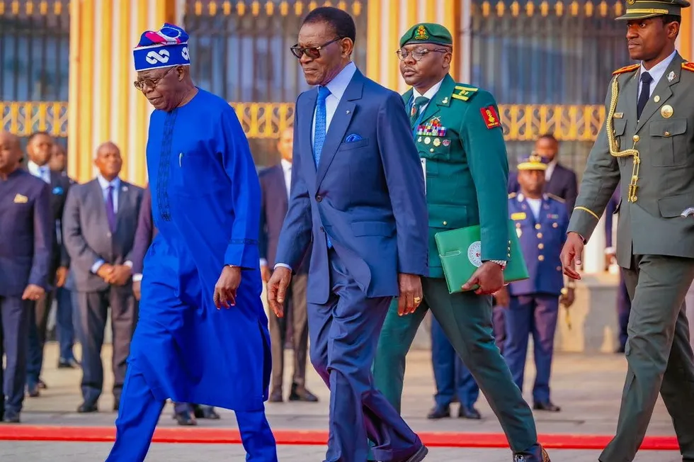 Nigeria's President Bola Tinubu (left) walks alongside his Equatorial Guinea counterpart President Teodoro Obiang Nguema Mbasogo during a state visit to Malabo this week.