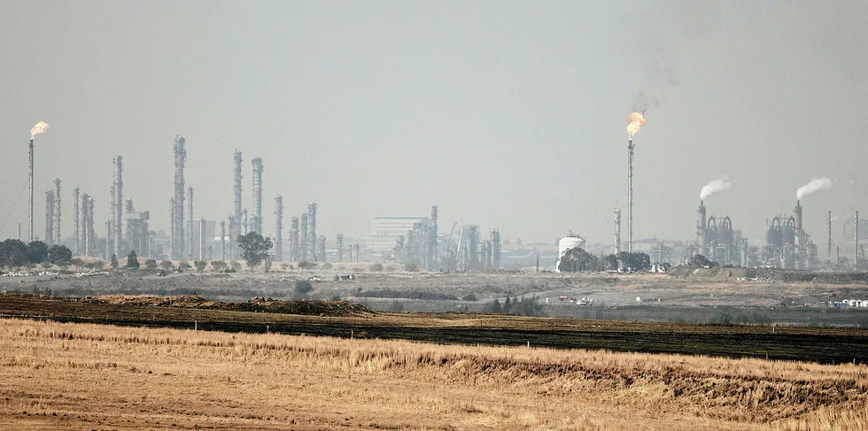 A picture taken on September 6, 2018 in Secunda shows the SASOL Secunda CTL that uses coal liquefaction to produce petroleum-like synthetic crude oil from coal.