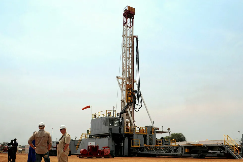 Expansion: workers at an oil exploration site in Buliisa district