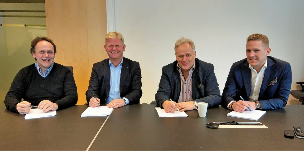 Harry Boe, Roger Granheim, Helge Gaso and Anders Gaso at the signing of the merger.