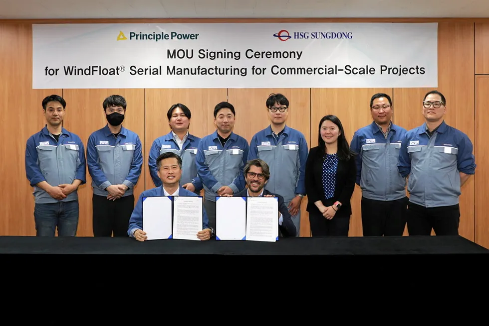 Principle Power and HSG Sungdong representatives celebrate the signing of their MoU.