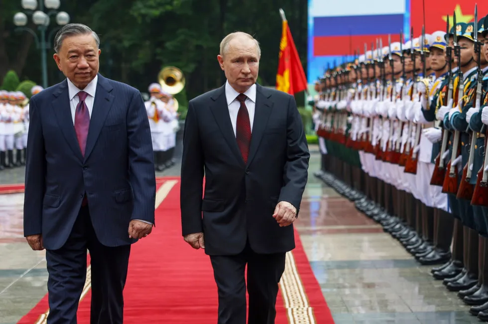 Vietnam’s President To Lam (left) and Russia’s President Vladimir Putin at the Presidential Palace in Hanoi Thursday.