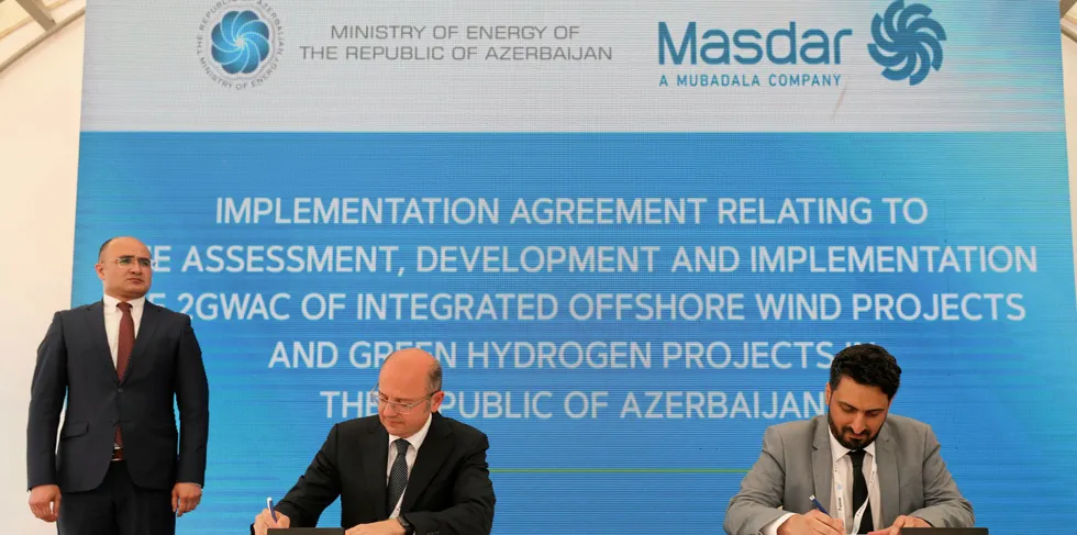Parviz Shahbazov, Azerbaijan's minister of energy (left), with Fawaz Al Muharrami, acting executive director of Masdar Clean Energy.