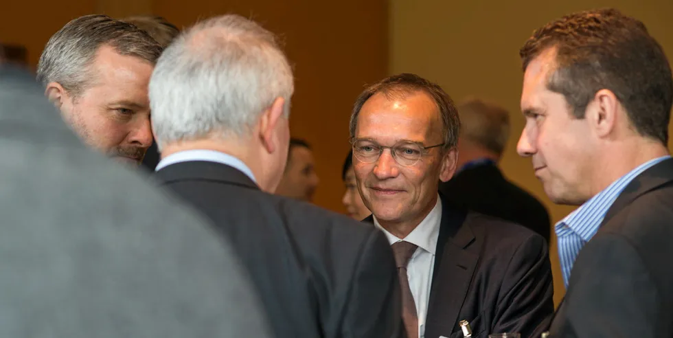 Mikael Tinghuus, CEO of Royal Greenland (center), flanked by Espersen CEO Klaus Nielsen (Left) and former Sanford CEO Volker Kunztsch (right).