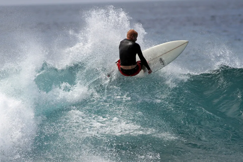 Eco Atlantic Oil & Gas chief executive Gil Holzman surfing off the Maldives.
