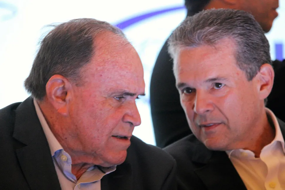 Cristiano Maia, president of Brazilian shrimp producer Potipora (left), confers with Aquaculture and Fisheries Minister Andre de Paula (right) before the opening ceremony of the Fenecan shrimp industry trade fair in Natal, northeast Brazil.