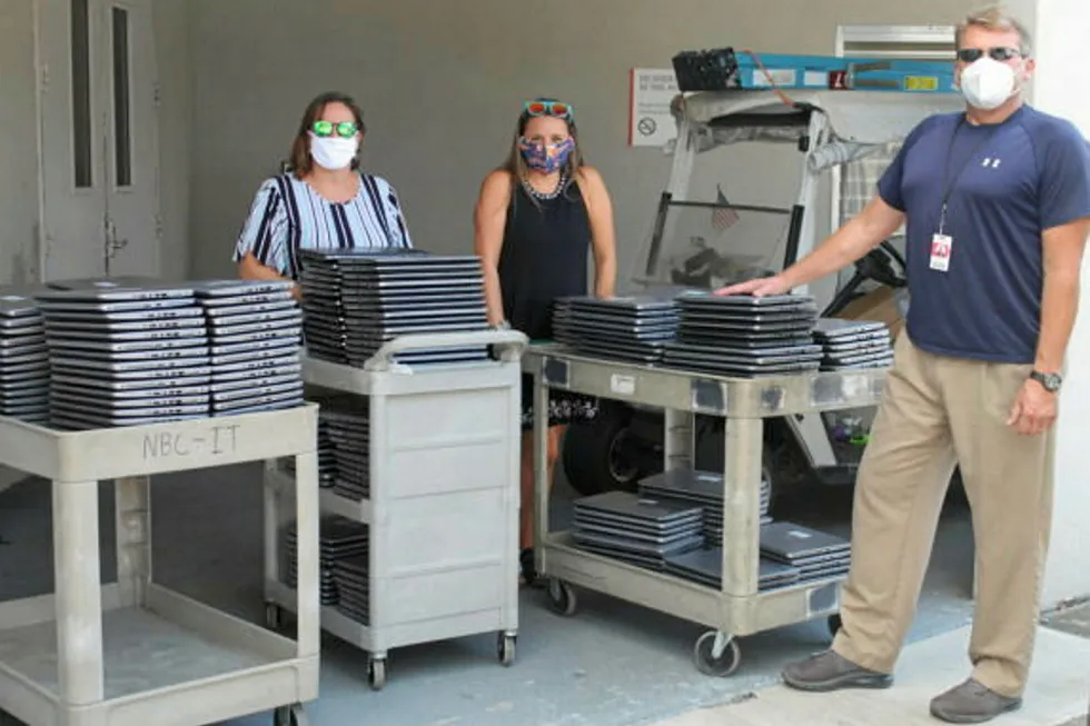Donations: Halliburton hands out laptops and phones to help students with education in Houston