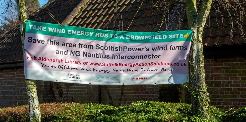 Campaign poster opposing onshore electricity substation plans in Aldeburgh, Suffolk, England.