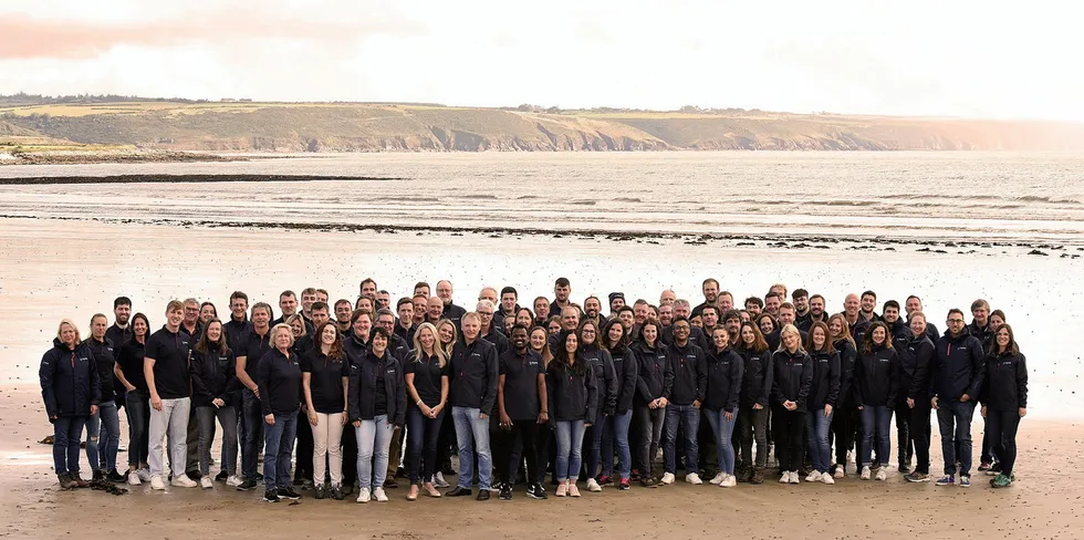 Cork, Ireland-based blue economy developer Simply Blue employees on the water's edge