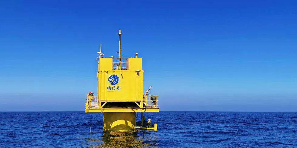 The platform that stands above the Neptune Ranch offshore Chinese salmon farm 60 km off the Weihai coast.