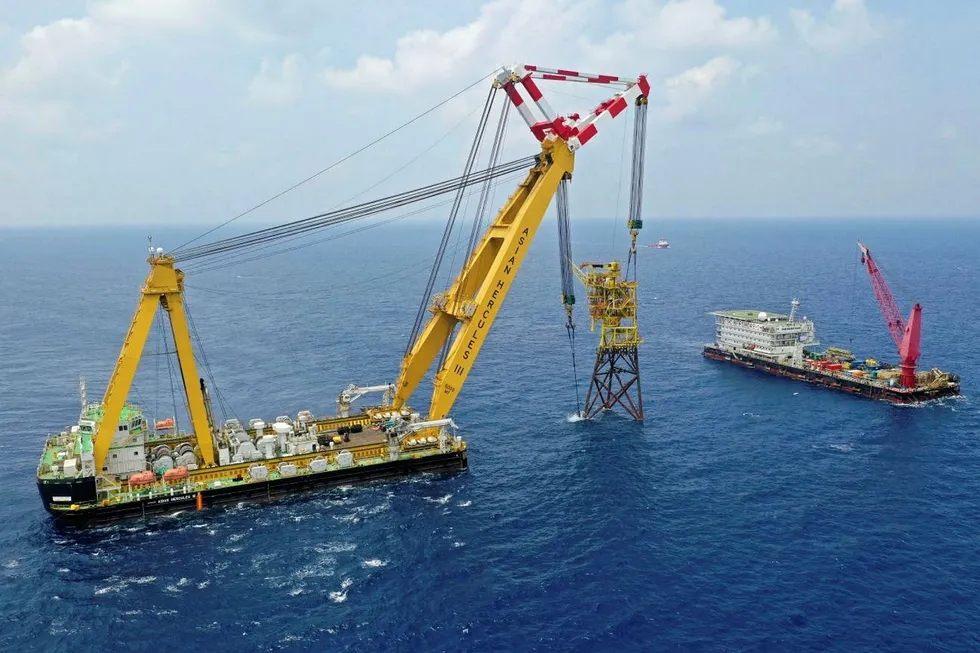 On the job: the Asian Hercules III barge lifts and relocates the wellhead platform to the Jitang field, Malaysia