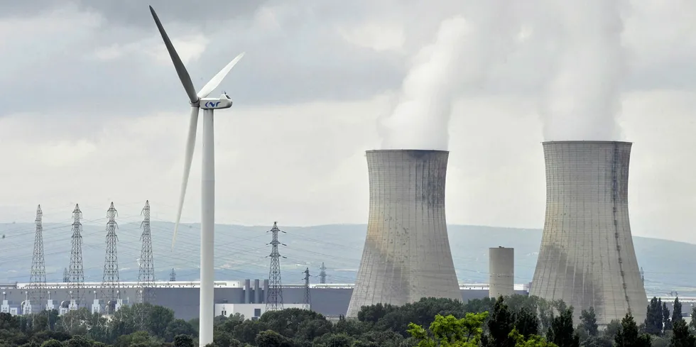 Wind turbine near French uranium enrichment plant in the Tricastin nuclear power center