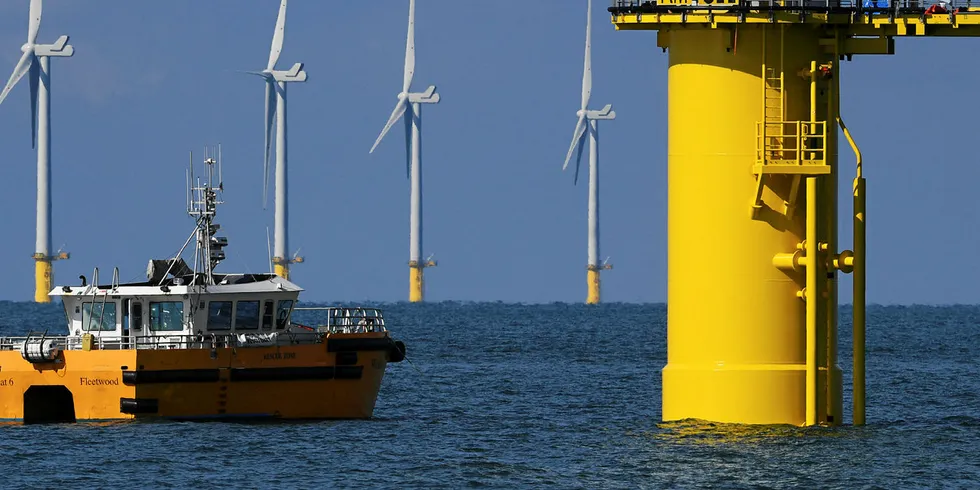 The Rampion wind farm off southern England, with a turbine crane clearly visible.